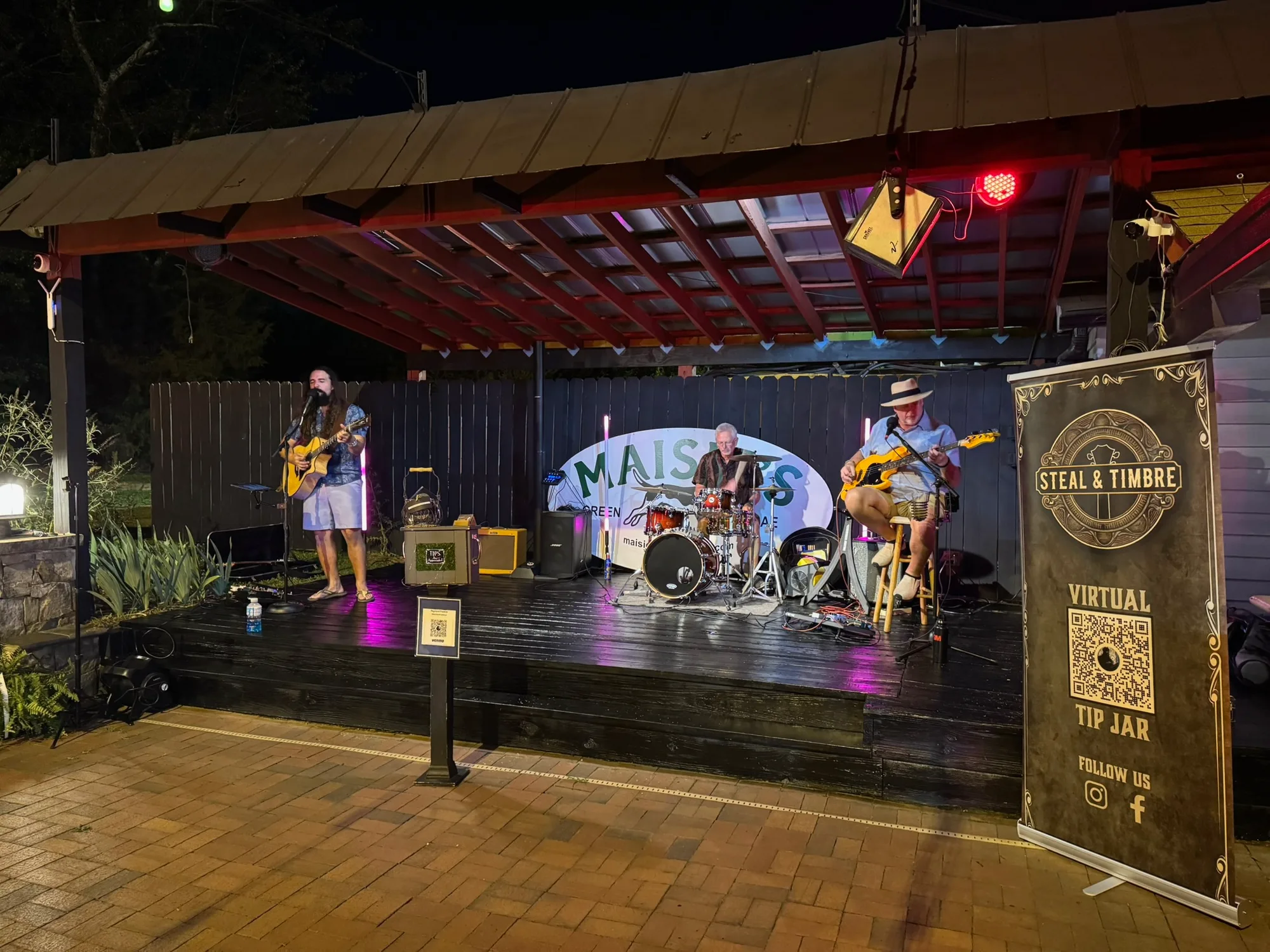 Steal and Timbre performing on the outdoor stage at Maisie's Green Brae, June 11 2026