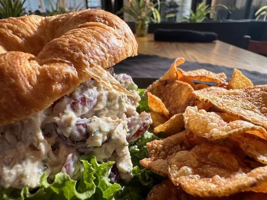 Chicken salad croissant with almond, grape, and basil chicken salad, leaf lettuce, and tomato at Maisie&rsquo;s Green Brae