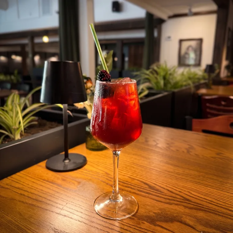 Last of the Light mocktail with blackberry, apple, lemon, and soda at Maisie’s Green Brae